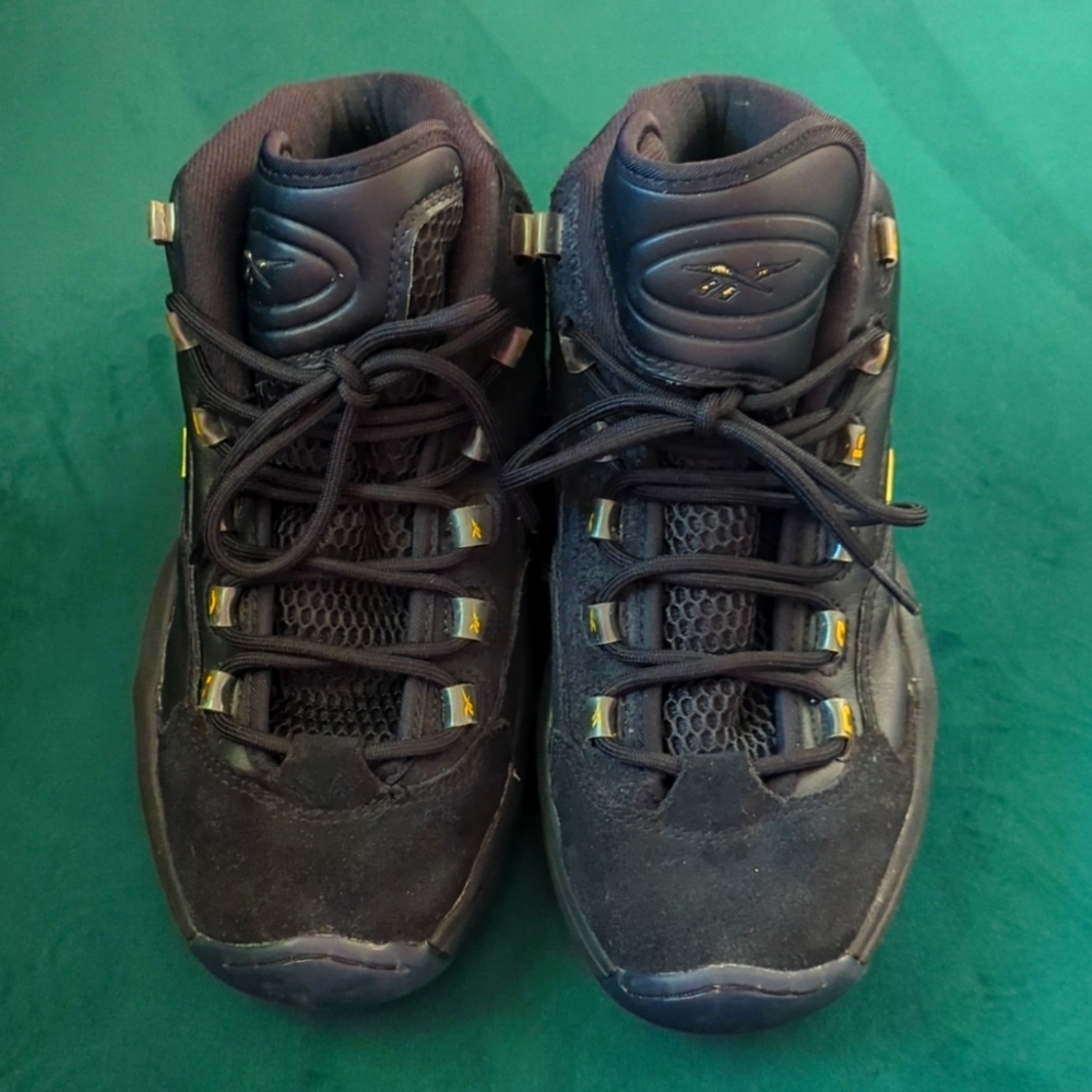 Reebok Question Mid Size 7 black and gold. Allen Iversons’